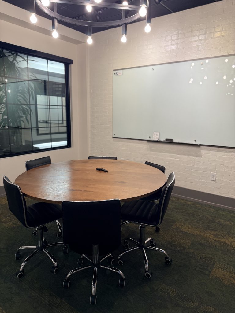 Private caucus room with a round table at the Allen office